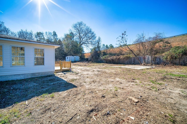 view of yard with a storage shed