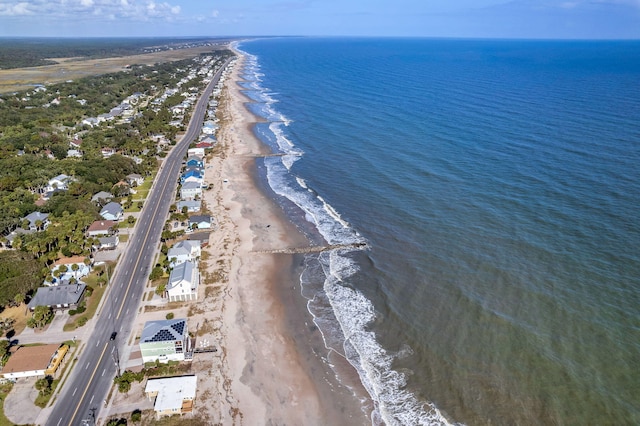 aerial view featuring a water view and a view of the beach