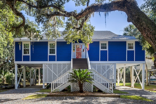 coastal inspired home with a carport