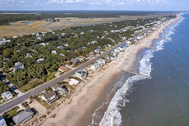 aerial view featuring a view of the beach and a water view