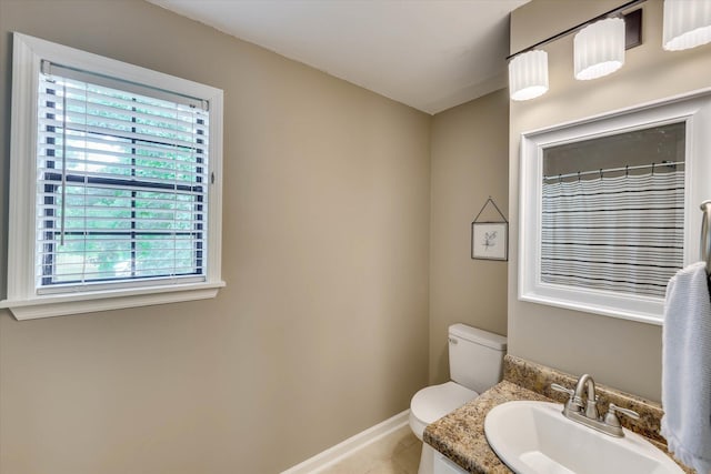 3866 Villa Ln, Martinez, GA 30907 - bathroom with plenty of natural light, tile patterned floors, and vanity