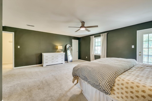 3866 Villa Ln, Martinez, GA 30907 - carpeted bedroom featuring multiple windows and a ceiling fan