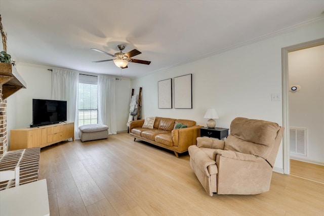 3866 Villa Ln, Martinez, GA 30907 - living room featuring a ceiling fan, crown molding, and light wood-type flooring