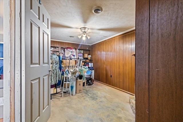 storage room with ceiling fan