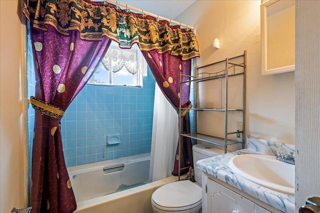 full bathroom featuring vanity, toilet, and shower / tub combo with curtain