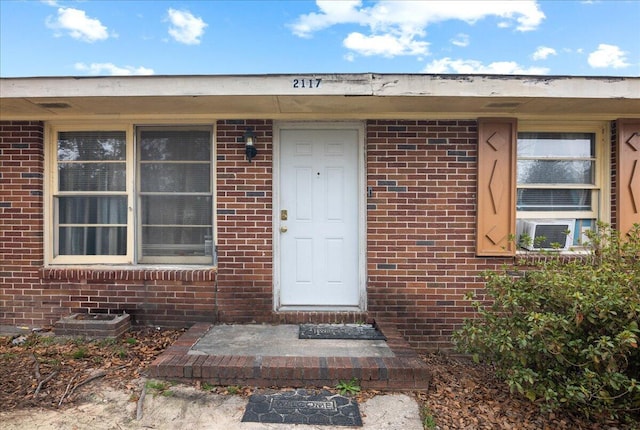 property entrance with cooling unit