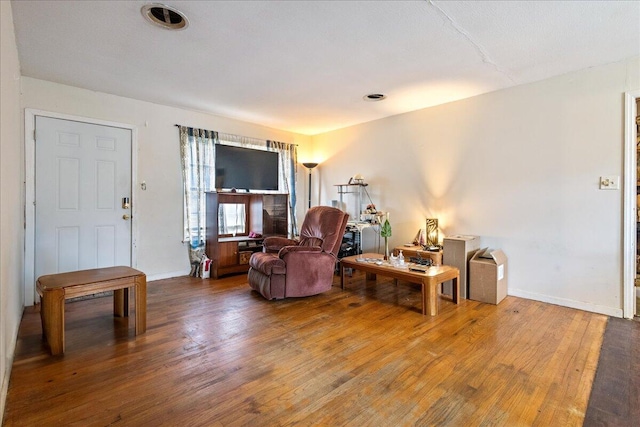 living room with hardwood / wood-style flooring