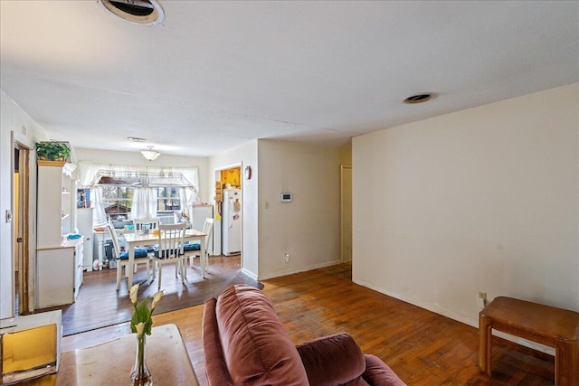 living room with wood-type flooring