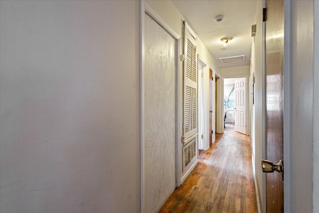 hallway featuring hardwood / wood-style floors