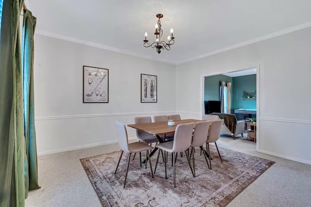 2928 Foxhall Cir, Augusta, GA 30907 - dining area featuring carpet floors, a chandelier, ornamental molding, and baseboards