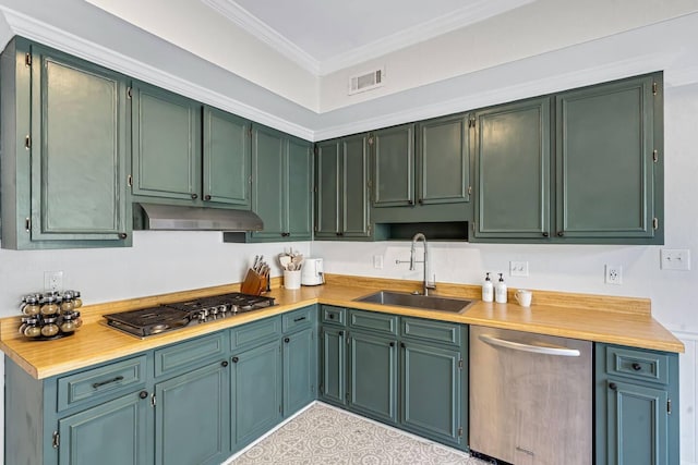 2928 Foxhall Cir, Augusta, GA 30907 - kitchen with a sink, appliances with stainless steel finishes, under cabinet range hood, light countertops, and ornamental molding