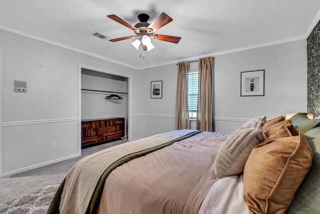 2928 Foxhall Cir, Augusta, GA 30907 - carpeted bedroom featuring ornamental molding, baseboards, ceiling fan, and a closet