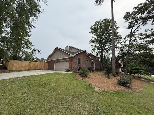 2928 Foxhall Cir, Augusta, GA 30907 - view of home's exterior with concrete driveway, brick siding, and an attached garage
