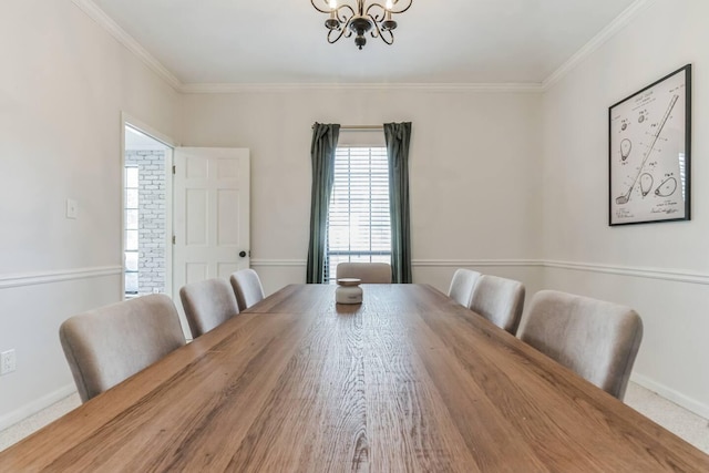 2928 Foxhall Cir, Augusta, GA 30907 - dining room with a chandelier, crown molding, and baseboards