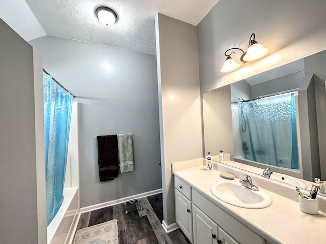 903 Arbor Springs Cir, Grovetown, GA 30813 - bathroom featuring wood finished floors, vanity, a textured ceiling, and shower / bathtub combination with curtain