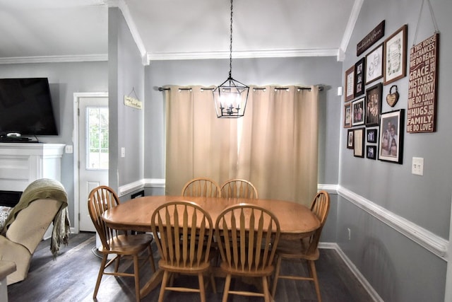 903 Arbor Springs Cir, Grovetown, GA 30813 - dining space with ornamental molding, a chandelier, and wood finished floors