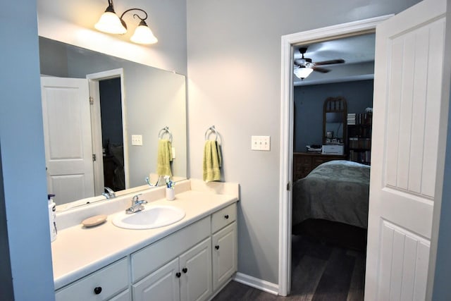 903 Arbor Springs Cir, Grovetown, GA 30813 - ensuite bathroom featuring vanity, wood finished floors, and ceiling fan