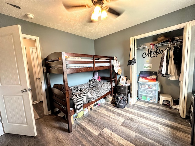 903 Arbor Springs Cir, Grovetown, GA 30813 - bedroom featuring wood finished floors, a textured ceiling, ceiling fan, and a closet