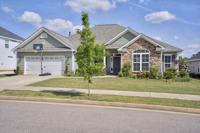 craftsman inspired home with driveway, an attached garage, a front lawn, and stone siding