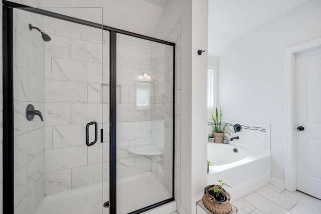 full bath featuring a garden tub and a stall shower