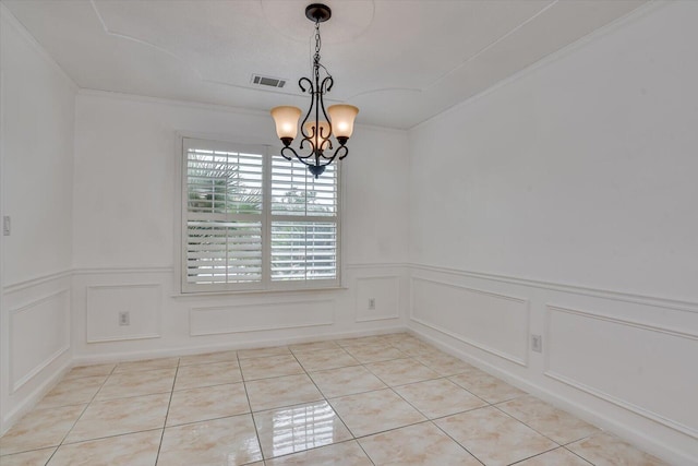 unfurnished dining area featuring light tile patterned flooring, a chandelier, and ornamental molding