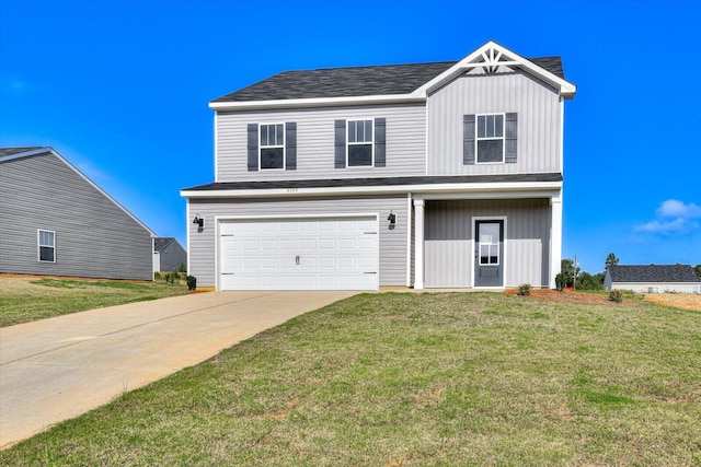 front of property with a garage and a front lawn