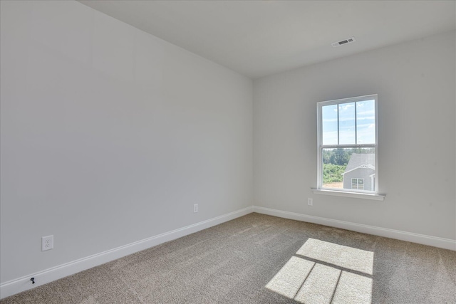 empty room featuring carpet floors