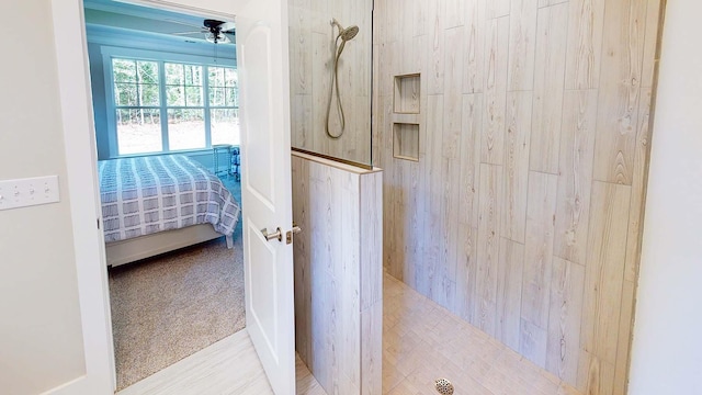 bathroom featuring a shower and ceiling fan