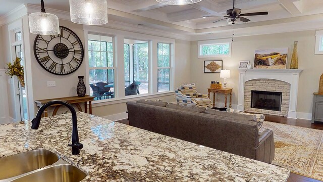 149 Cypress Dr, Mccormick, SC 29835 - living room featuring wood finished floors, a ceiling fan, coffered ceiling, crown molding, and beamed ceiling