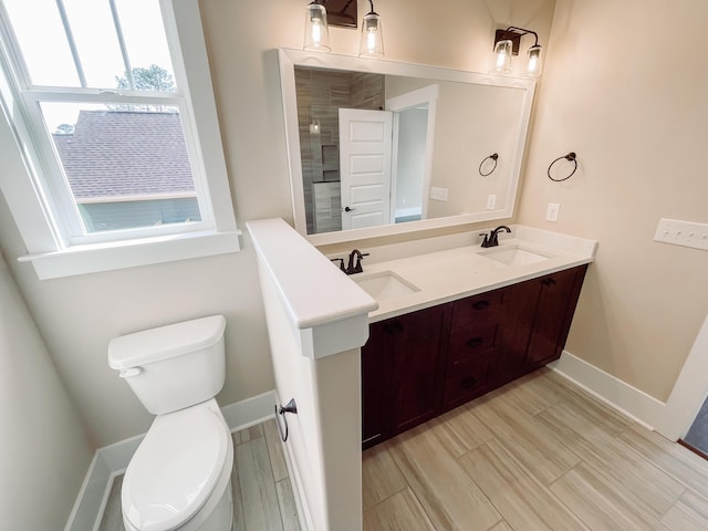 149 Cypress Dr, Mccormick, SC 29835 - full bathroom featuring a sink, double vanity, toilet, and baseboards