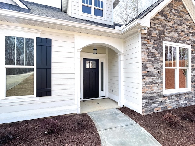 149 Cypress Dr, Mccormick, SC 29835 - doorway to property featuring a shingled roof and stone siding