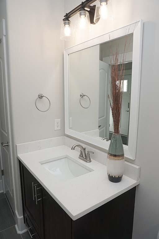 bathroom with tile patterned flooring and vanity