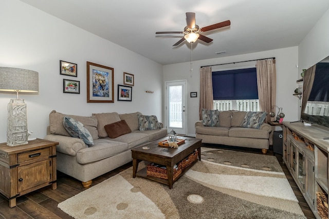 living room featuring ceiling fan