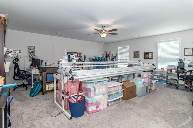 bedroom featuring light carpet and ceiling fan