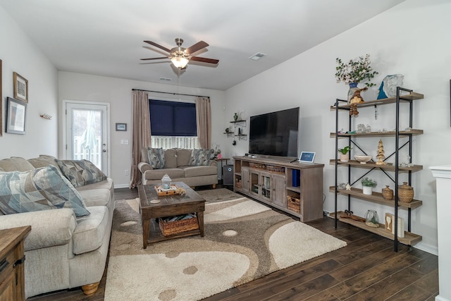 living room featuring ceiling fan