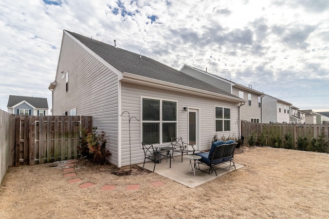 back of house featuring a patio area