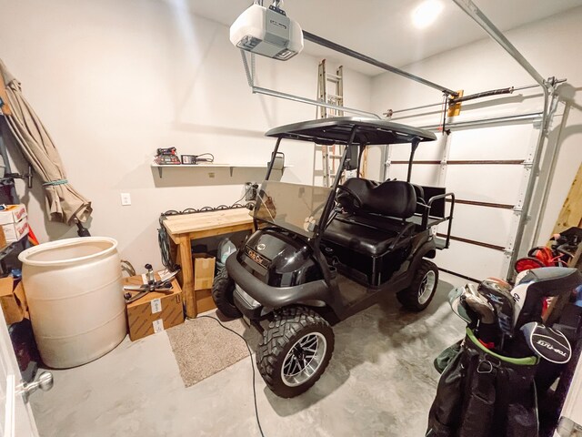 garage featuring a garage door opener