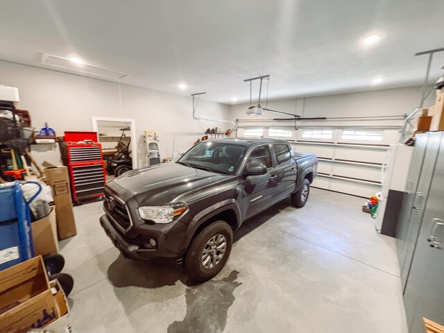 garage featuring a garage door opener