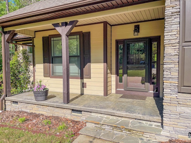 153 Cumberland Dr, Mccormick, SC 29835 - property entrance with covered porch and stone siding