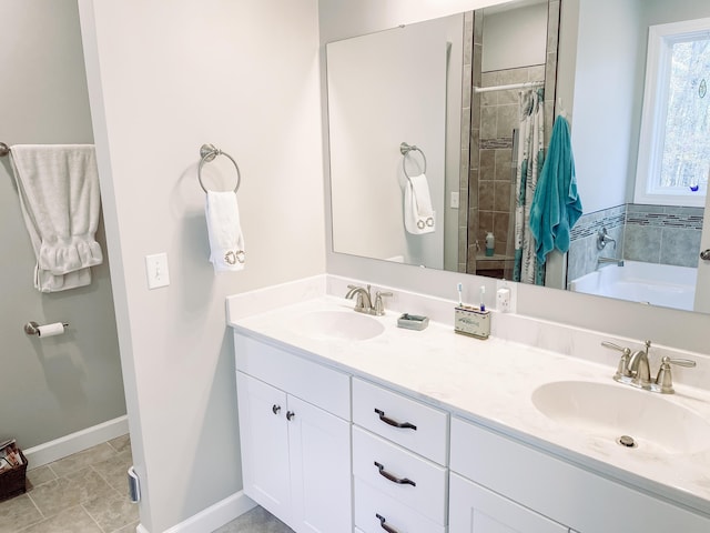 bathroom featuring tile patterned flooring, vanity, and shower with separate bathtub