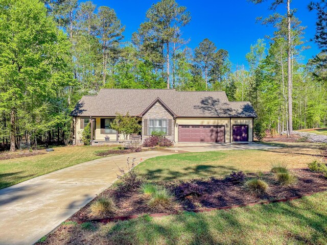 153 Cumberland Dr, Mccormick, SC 29835 - view of front of home with a garage, a front lawn, driveway, and a shingled roof