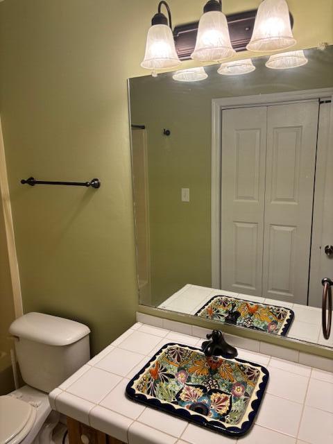 bathroom featuring toilet