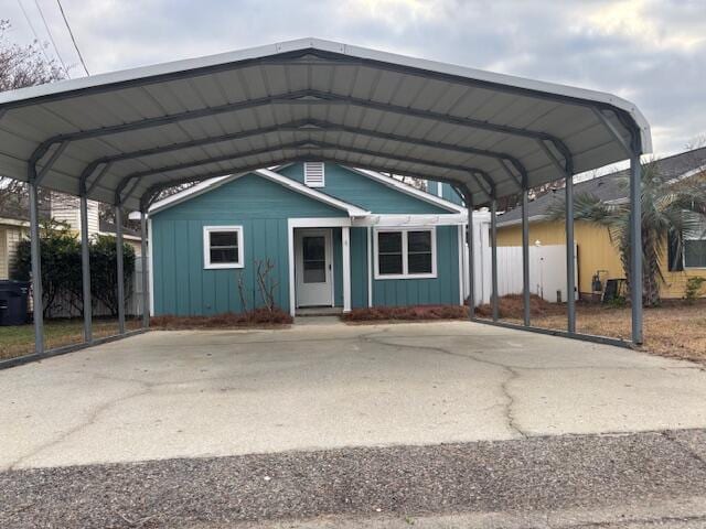 view of parking featuring a carport