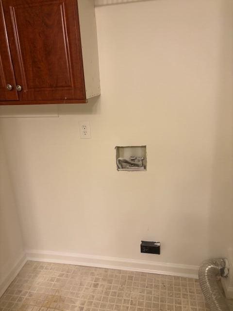 laundry area featuring cabinets and washer hookup