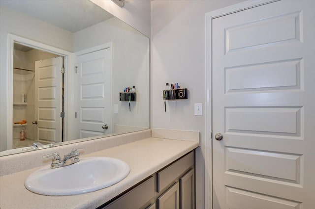 bathroom featuring shower / bath combination and vanity