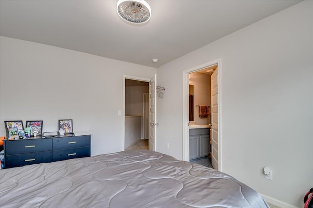 bedroom featuring ensuite bath