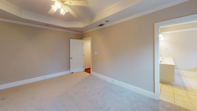135 Coach Ln, Augusta, GA 30907 - empty room featuring light carpet, a tray ceiling, visible vents, ceiling fan, and crown molding