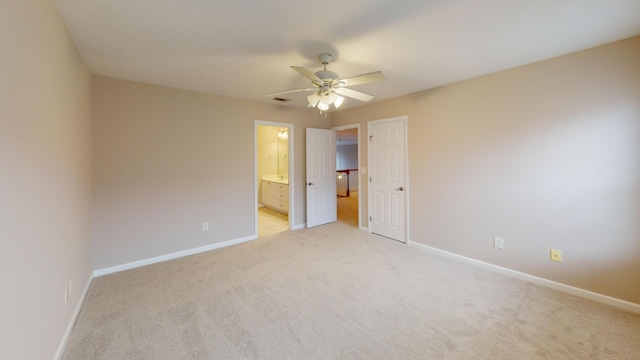 135 Coach Ln, Augusta, GA 30907 - unfurnished bedroom with ensuite bath, visible vents, baseboards, and light carpet