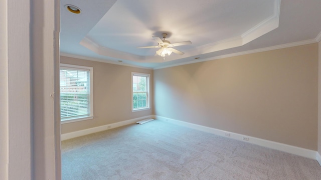 135 Coach Ln, Augusta, GA 30907 - carpeted spare room with ceiling fan, baseboards, ornamental molding, and a tray ceiling