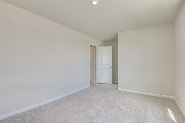 909 Kay Pl, Grovetown, GA 30813 - spare room featuring light colored carpet and recessed lighting